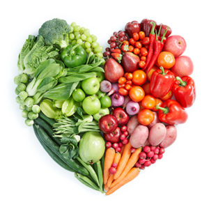 Healthy vegetables arranged in a heart shape